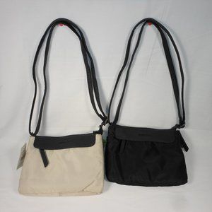 2 new Roots canvas shoulder bags.